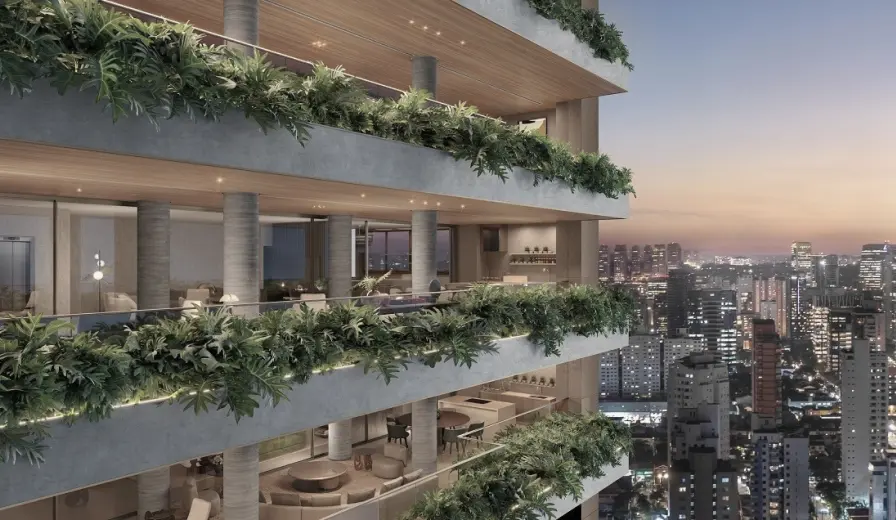 Empreendimento Tegra e ao fundo uma cidade a noite.